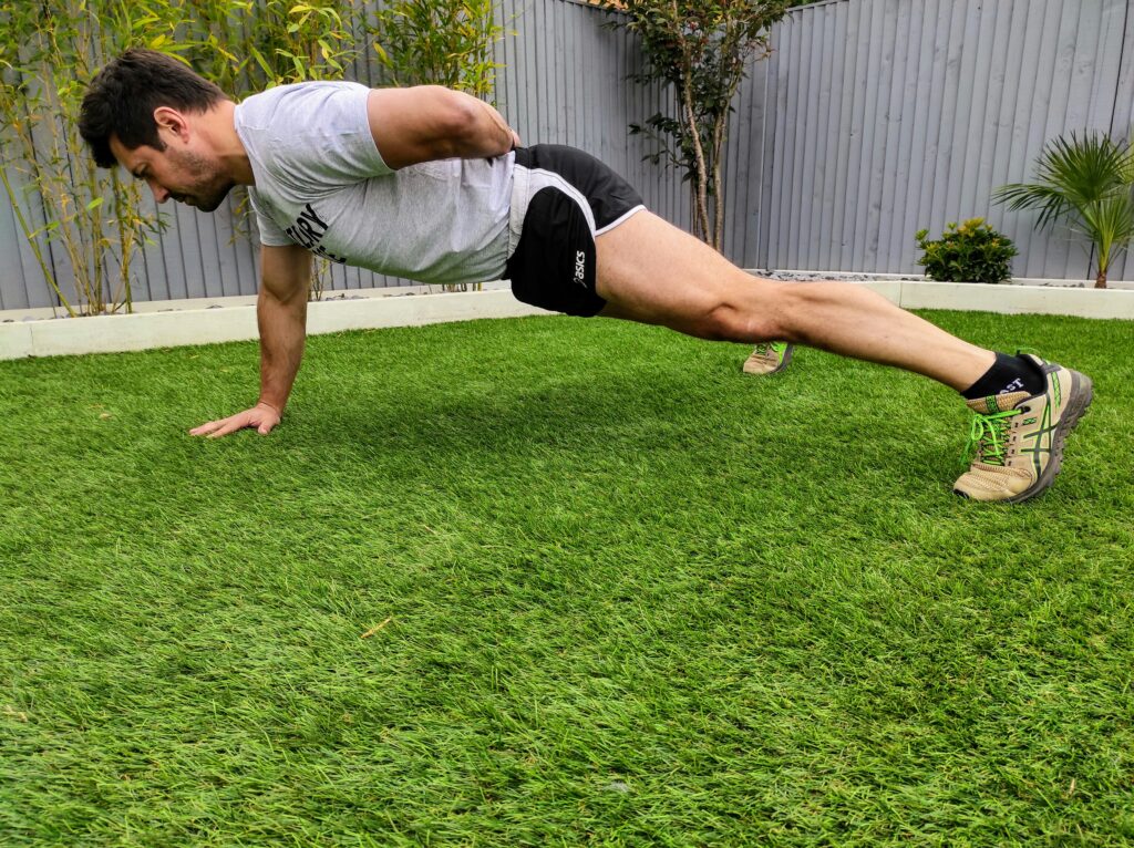 man doing one-hand push-ups