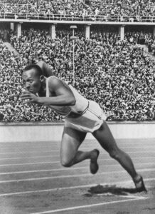 Jesse Owens running a marathon in the Olympics